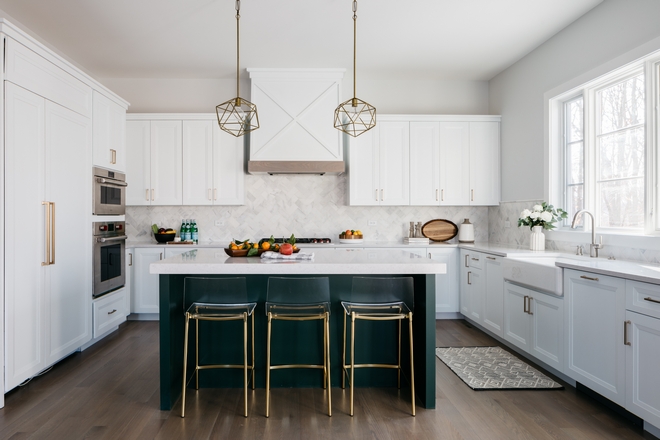 From the color scheme to the easy-to-clean counterstools this kitchen is fun as it is functional Other things to note you won't find glass cabinets in this kitchen nor cabinet knobs