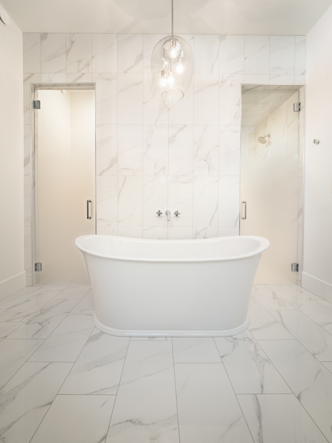 Bathroom with marble tile and ombre frosted glass doors that enclose the custom tiled shower and water closet Bathroom with marble tile and ombre frosted glass doors that enclose the custom tiled shower and water closet Bathroom with marble tile and ombre frosted glass doors that enclose the custom tiled shower and water closet #Bathroom #marbletile #ombrefrostedglass #frostedglass #frostedglassdoors #shower #watercloset