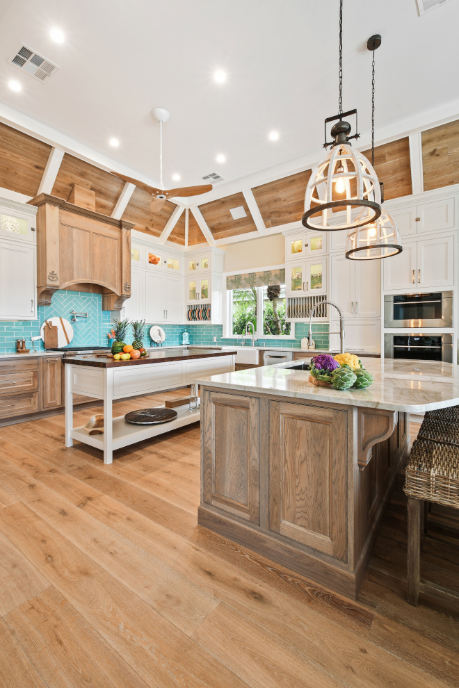 https://www.homebunch.com/wp-content/uploads/2021/07/Coastal-Kitchen-Driftwood-Cabinet-Turquoise-Backsplash-Tile-Two-Islands-whitewash-wood-cage-pendant-light-Coastal-Kitchen-Design.jpg