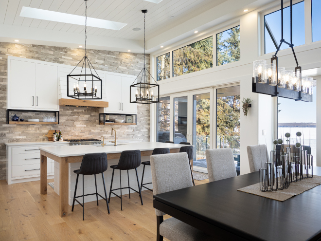 Kitchen Skylighht Kitchen Windows Large windows and multiple skylights bring an abundance of natural light into the kitchen and dining room #Kitchen #Skylighht #Kitchenskylight #KitchenWindows #Largewindows #skylights #naturallight #diningroom