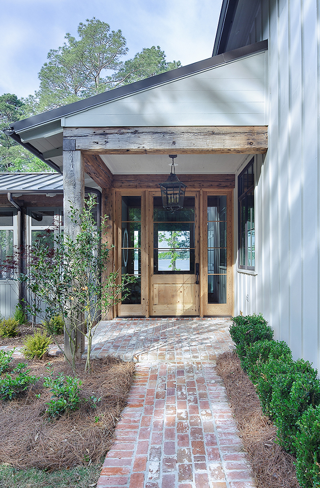 Wood front door with Benjamin Moore Revere Pewter Siding and Sherwin Williams Iron Ore Accents Wood front door with Benjamin Moore Revere Pewter Siding and Sherwin Williams Iron Ore Accents Wood front door with Benjamin Moore Revere Pewter Siding and Sherwin Williams Iron Ore Accents #Woodfrontdoor #BenjaminMooreReverePewter #Siding #SherwinWilliamsIronOre