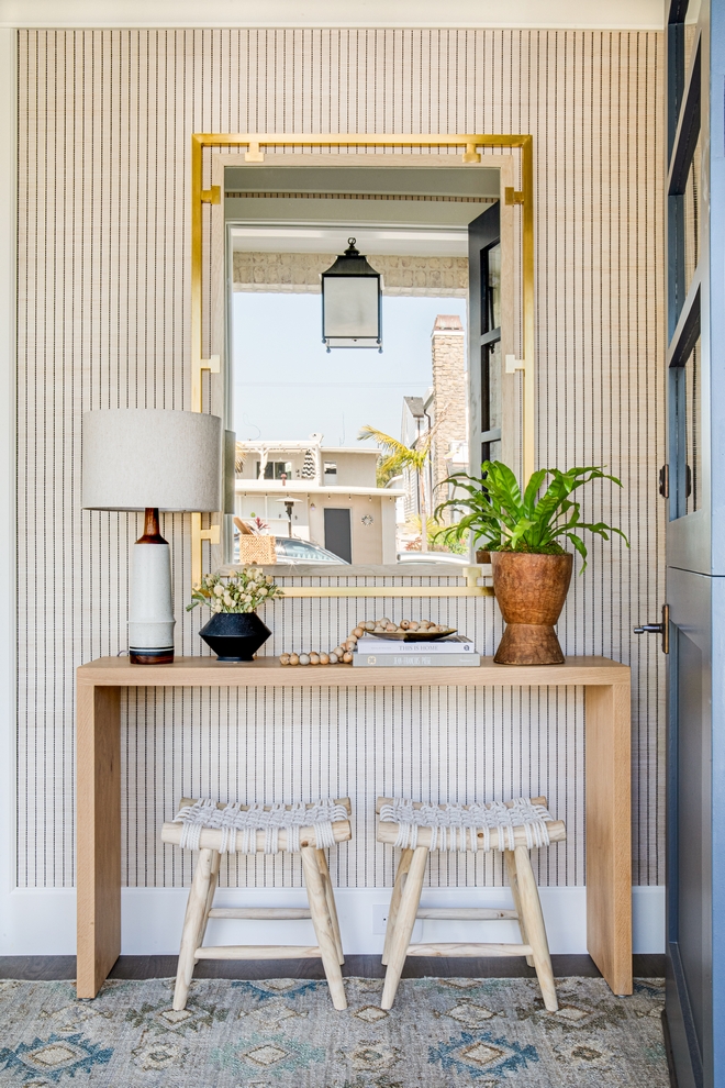 Transitional Beach House Interiors Transitional in design, this beach house embodies a fresh take on coastal style, utilizing a neutral color palette, natural fibers, and organic elements throughout #TransitionalBeachHouse #BeachHouseInteriors #TransitionalInteriors #beachhouse #coastal #coastalstyle #neutralcolorpalette #colorpalette #naturalfibers #organicelements