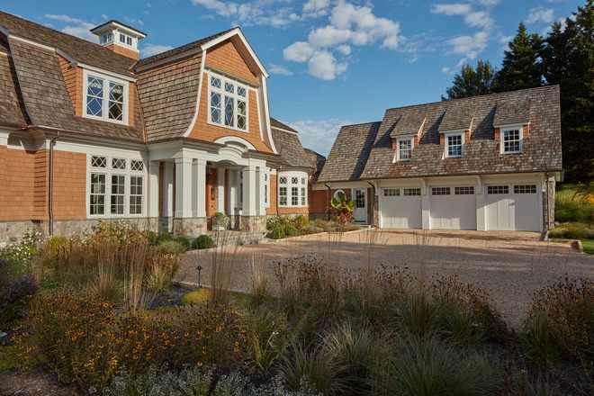 Shingle Home Architecture The gambrel roofs diagonal divided lites in the windows capped oval windows and a large eyebrow dormer create a delightful presence from the street and from the water Shingle Home Architecture #ShingleHome #Architecture #gambrelroof #windowlites #windows #cappedovalwindows #ovalwindow #eyebrowdormer #ShingleHome #Architecture