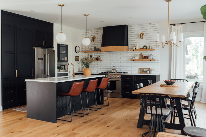 Black Kitchen We went bold in our kitchen with black cabinets but felt balanced with the floors and the wall color It’s the perfect anchor to our open concept living space Black Kitchen Black Kitchen #BlackKitchen #blackcabinets #kitchen