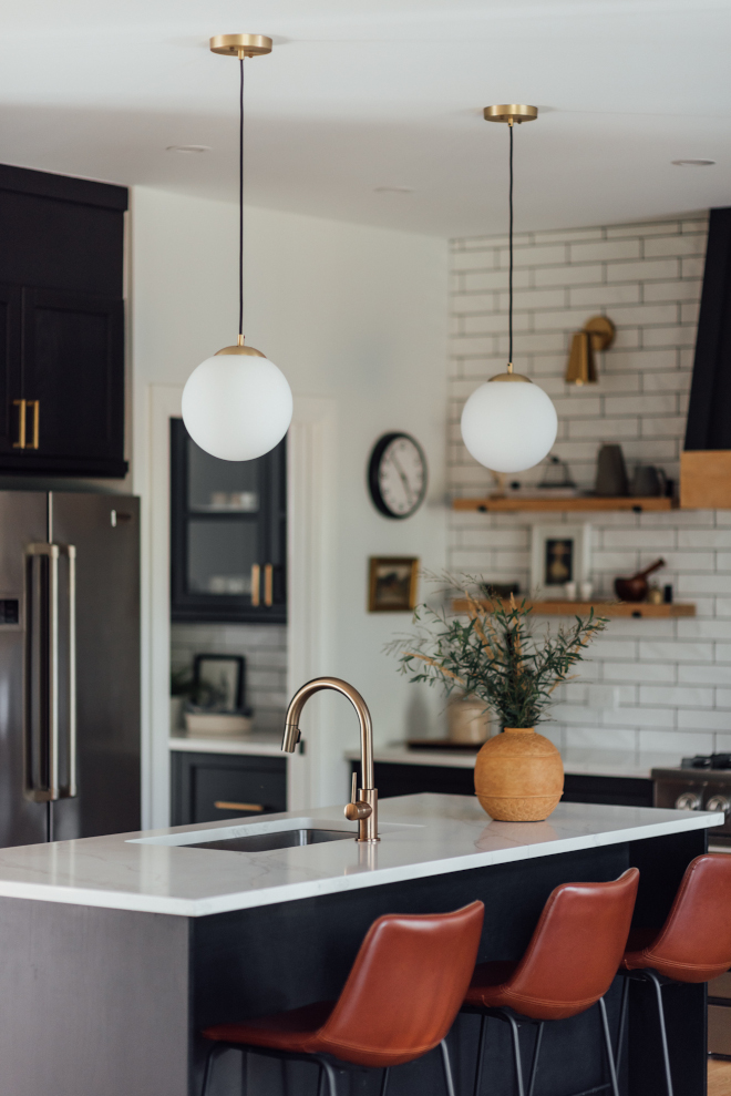 Black Modern Farmhouse Kitchen with Brushed brass with milk glass pendant and Saddle Leather Counterstool Black Modern Farmhouse Kitchen with Brushed brass with milk glass pendant and Saddle Leather Counterstool #BlackModernFarmhouseKitchen #ModernFarmhouseKitchen #Brushed #brasspendant #milkglasspendant #SaddleLeatherCounterstool #LeatherCounterstool