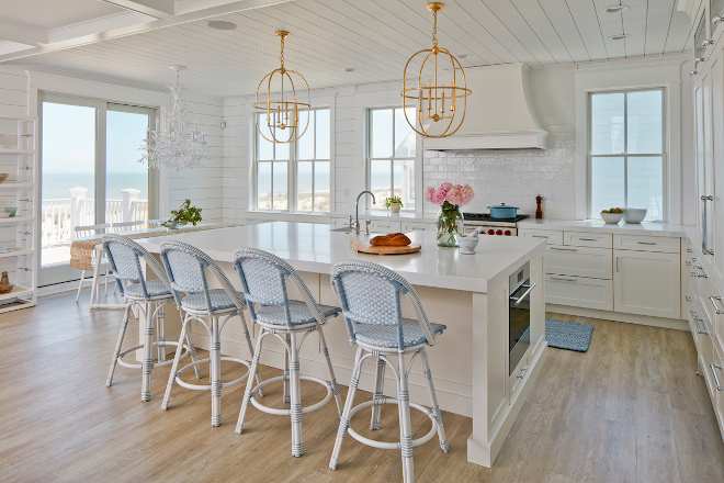 Nothing says beach house, quite like a bright white kitchen and this gourmet kitchen is an entertaining dream Beach house kitchen #beachhouse #beachhousekitchen #beachhouse #brightwhitekitchen #gourmetkitchen