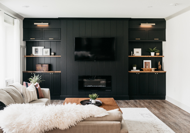 TV Room Basement TV Room Black Cabinet We did built-ins for storage for movies and board games but also to hide the TV so it remains the focal point of the room but visually it does not stand out TV Room Basement TV Room Black Cabinet TV Room Basement TV Room Black Cabinet #TVRoom #Basement #BasementTVRoom #BlackCabinet