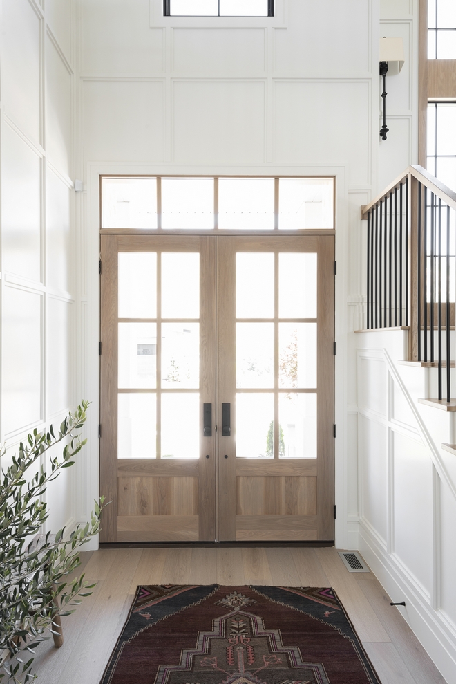 Double wooden front doors welcome you into a breathtaking foyer with plenty of exquisite millwork Double wooden front doors welcome you into a breathtaking foyer with plenty of exquisite millwork Double wooden front doors welcome you into a breathtaking foyer with plenty of exquisite millwork Double wooden front doors welcome you into a breathtaking foyer with plenty of exquisite millwork #Doublewoodendoor #frontdoors #frontdoor #foyer #millwork