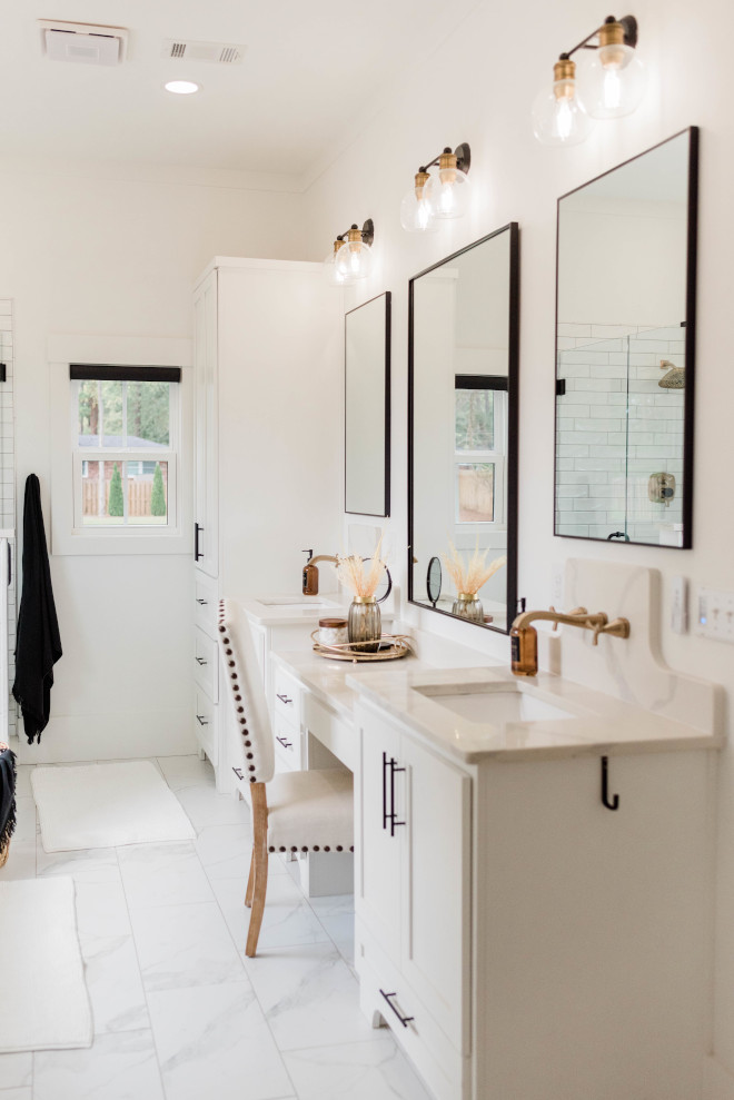 Bathroom Renovation I designed my dream bathroom complete with a soaking tub knee space vanity to get ready white everything gold fixtures quartz and all the cabinet storage my heart desired #Bathroom #BathroomRenovation #dreambathroom #soakingtub #kneespacevanity #vanity #goldfixtures #quartz #cabinet #storage