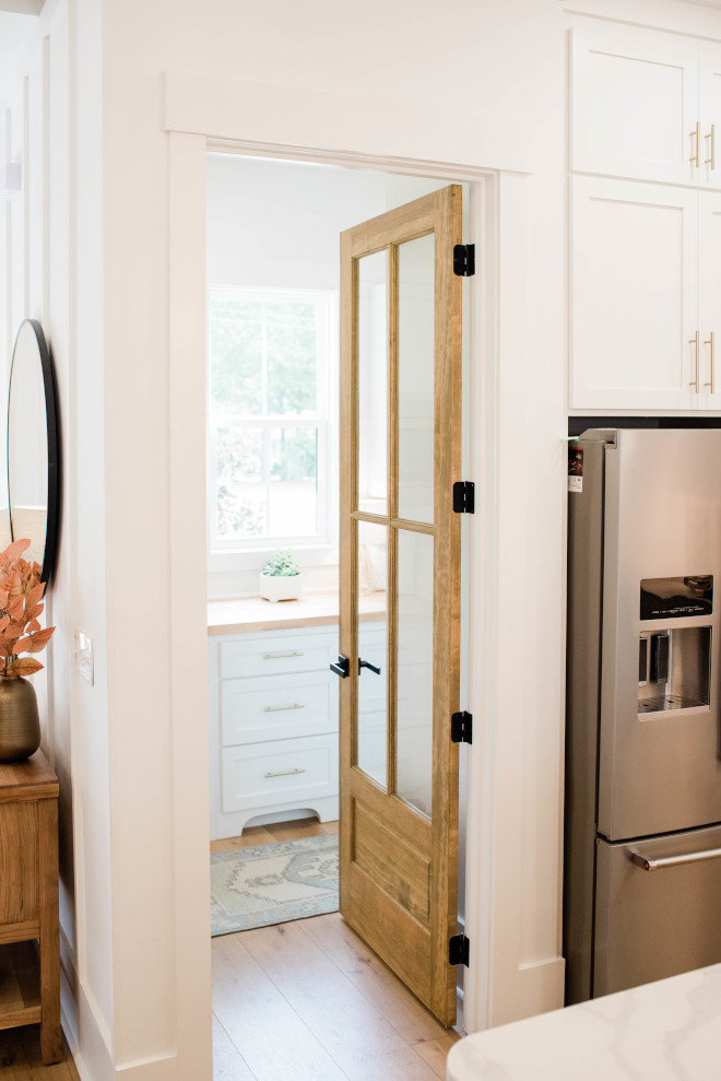 Walk-in Pantry Walk-in Pantry A wood and glass interior door conceals the Walk-in Pantry A 3/4 four lite wood and glass interior door conceals the Walk-in Pantry A 3/4 four lite wood and glass interior door conceals the Walk-in Pantry #walkinpantry #pantry #pantrydoor #4litedoor #woodglassdoor #interiordoor