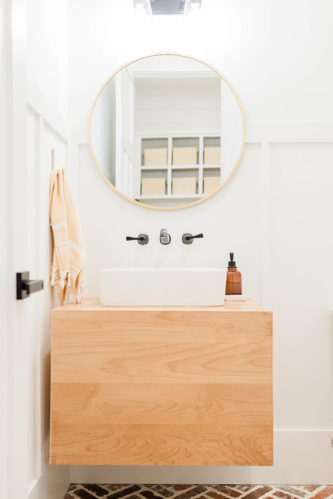 Chunky wood vanity A chunky wood vanity along with brick flooring add interest and warmth to the Powder Room Chunky wood vanity Chunky wood vanity #Chunkywoodvanity #woodvanity #brickflooring #brick #flooring