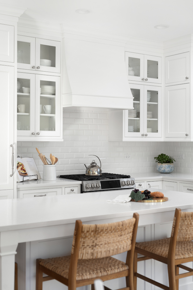 Kitchen Hood Custom cabinetry along with carefully selected hardware and details such as a custom kitchen hood and crown detail make this white kitchen feel unique and special The hood becomes the center of the attention when glass cabinets are added to both sides Kitchen Hood Custom cabinetry along with carefully selected hardware and details such as a custom kitchen hood and crown detail make this white kitchen feel unique and special The hood becomes the center of the attention when glass cabinets are added to both sides #KitchenHood #Customcabinetry #hardware #kitchenhood #crownmolding #kitchencrownmolding #cabinetcrownmolding #whitekitchen #glasscabinets