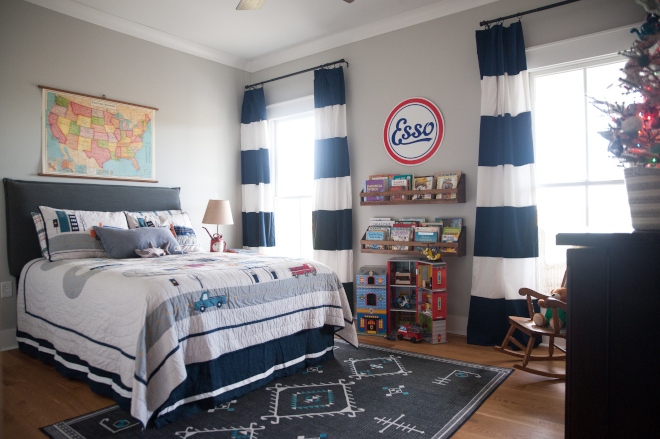 My son’s room is more modern-vintage inspired with nods to travel and automobile love #sonsbedroom #boysbedroom #vintagesigns #esso #boybedroomdesign
