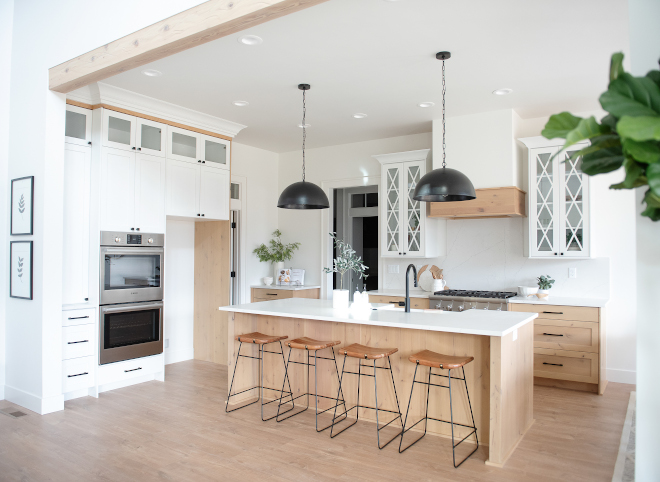 Two-toned white kitchen with wood cabinets Upper Cabinets are a combination of Pure White SW 7005 by Sherwin Williams with Knotty Alder accents Two-toned white kitchen with wood cabinets Upper Cabinets are a combination of Pure White SW 7005 by Sherwin Williams with Knotty Alder accents #Twotonedwhitekitchen #Twotonedkitchen #woodcabinets #UpperCabinets #PureWhiteSW7005bySherwinWilliams #SherwinWilliams #KnottyAlder #Alderaccents