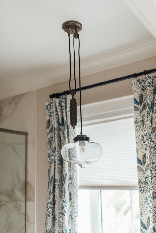 The pendant which hangs over the freestanding tub was another rescued piece from the original historic home