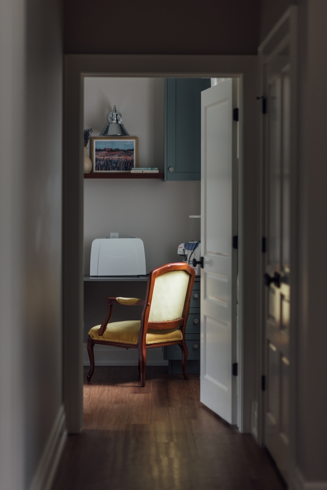 This room pulls double duty as a laundry room and sewing room