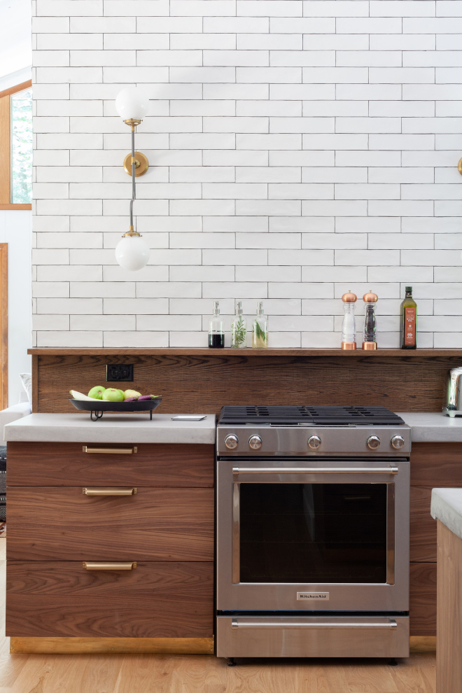 Kitchen Backsplash tile is separated by a Walnut backsplash with shelf kitchen trends New kitchen trends mixed backplash #Kitchen #Backsplash #tile #Walnut #kitchenshelf #kitchentrends #Newkitchen #trends #mixedbackplash