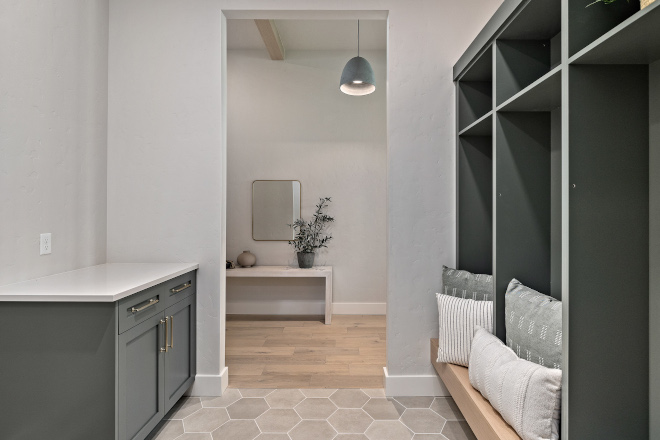 The Mudroom features Drop Station with custom cabinets in Sherwin Williams Pewter Green #Mudroom #dropoffzone