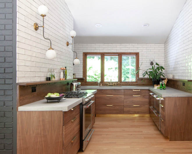 Walnut cabinets are accentuated with brass hardware and brushed brass toe kick for an extra lux look #Walnutkitchen #Walnut #kitchencabinets #walnutkitchencabinet #walnutcabinet #kicktoe
