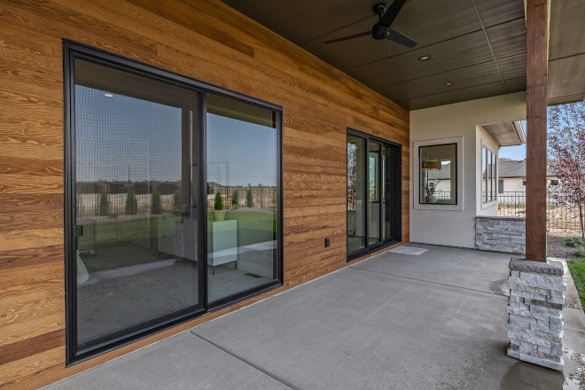 Wood looking Siding is Montana Timber Products Pre-Finished Aquafir Collection Wire Brush Doug Fir in the color Brown with no knots #woodsiding #woodlookingsiding #siding