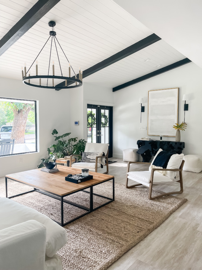 Black and white living room with black beams shiplap vaulted ceiling Black and white Modern Farmhouse look Black and white living room with black beams shiplap vaulted ceiling Black and white Modern Farmhouse look #Blackandwhite #livingroom #blackbeams #shiplap #shiplapceiling #vaultedceiling #Blackandwhite #ModernFarmhouse #ModernFarmhouselook