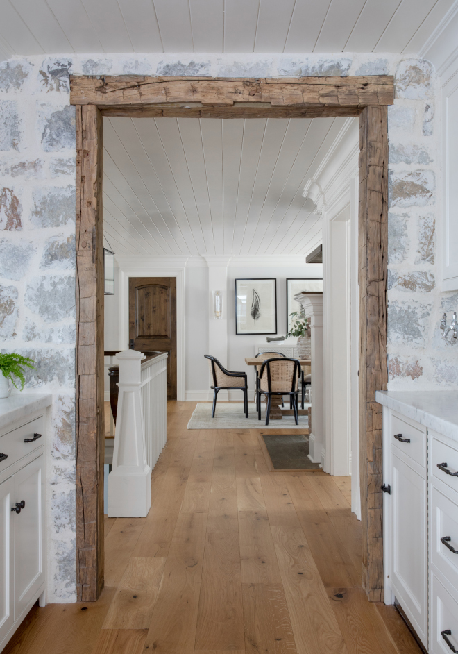 Rustic Beams along with over-grouted stone on walls add patina and a rustic charm to the Butler's Pantry #Butlerspantry #pantry #Frenchfarmhouse