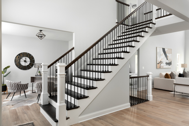 Right before the staircase is an entryway into the formal living room space of the home which can also be used as an open office #office #homeoffice #foyer #homelayout #staircase