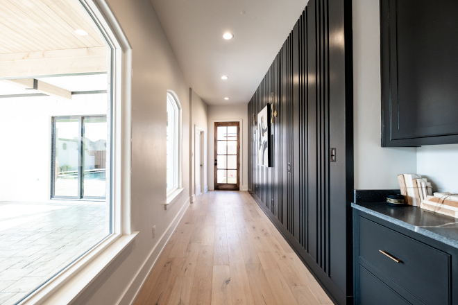 There's nothing boring about this hallway A custom accent wall certainly elevates this entire space #hall #hallway #customwall