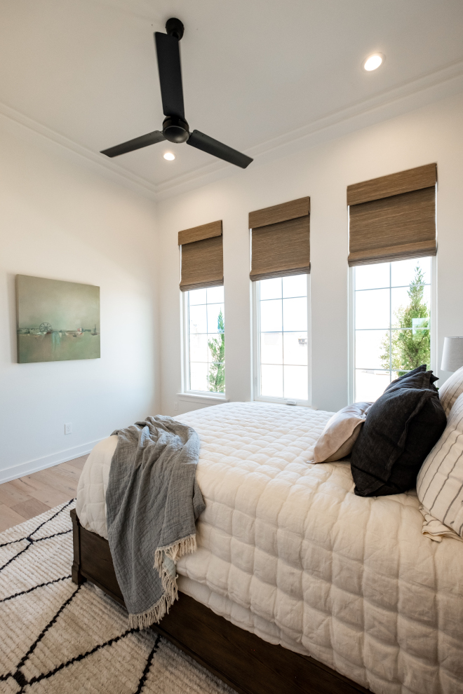 This Bedroom features a double crown step up treatment that frames in the entire ceiling