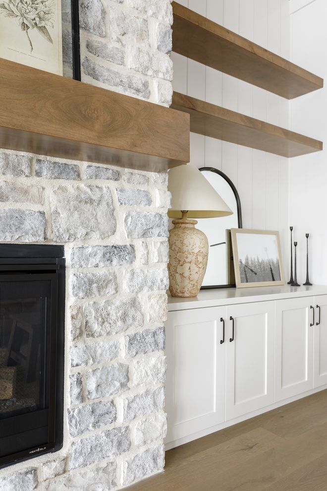 Wainscoting Vertical Shiplap behind shelves on entertainment cabinet wall Paint color is Sherwin Williams SW 7004 Snowbound Mantle and Shelves Custom in Sherwin Williams Rustic Gray