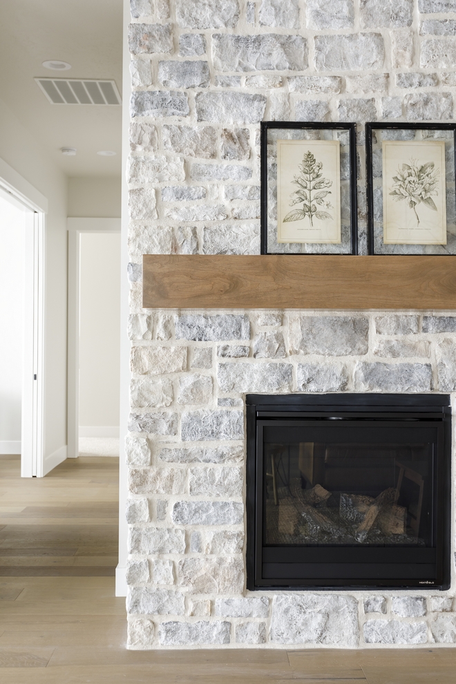 One of my favorite elements in this home is the fireplace stone. This is the Eldorado Limestone in Grand Banks and I'm loving the way this stone looks like it has had a wash of mortar over it #stone