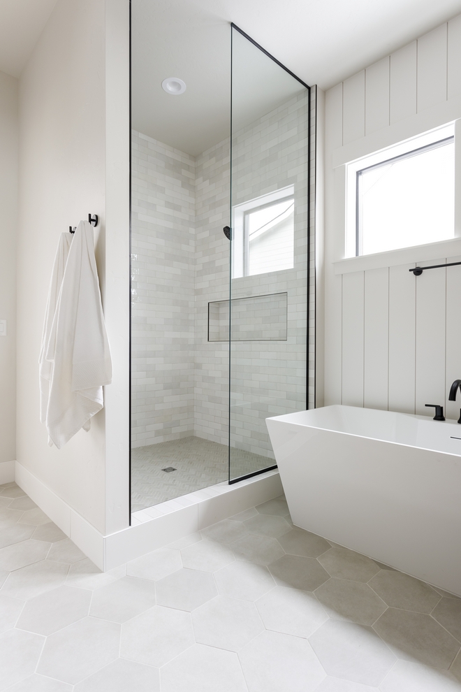 Bathroom Tile On the floor I kept it soft and neutral with a light gray hexagon and the white trendy tile in the shower #tile #bathroom #bathroomtile