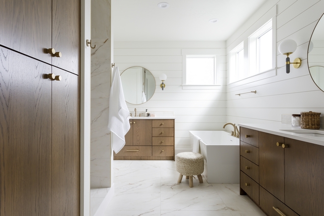 The Primary Bathroom was all about layers Starting from the wainscot on the wall to the lighting tile cabinetry and finishing touches I wanted everything to feel classic warm and bright #PrimaryBathroom #bathroom
