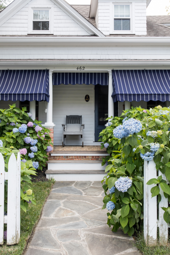 White picket fences along with a Bluestone pathway with hydrangeas make this beach cottage feel even more enchanting White picket fences along with a Bluestone pathway with hydrangeas make this beach cottage feel even more enchanting White picket fences along with a Bluestone pathway with hydrangeas make this beach cottage feel even more enchanting #Whitepicketfence #Bluestone #pathway #hydrangeas #beachcottage #summer