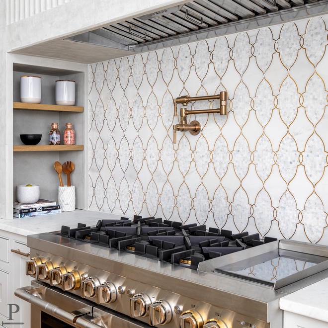 Empress Helena Asian Statuary with Brass Line Backsplash tile lux tile lux kitchen lux homes