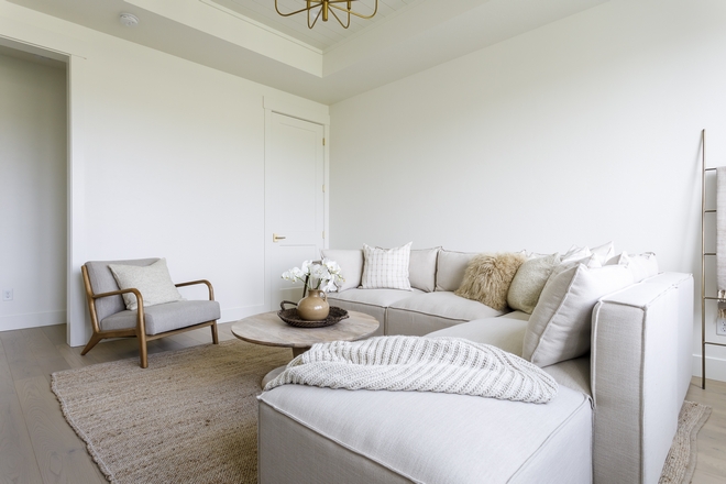 This living room was all about comfort I wanted layers of white taupe and cream with heavy texture to feel supremely cozy and perfect for the days when a good book and a warm drink are all you need #livingroom #textures #warmth