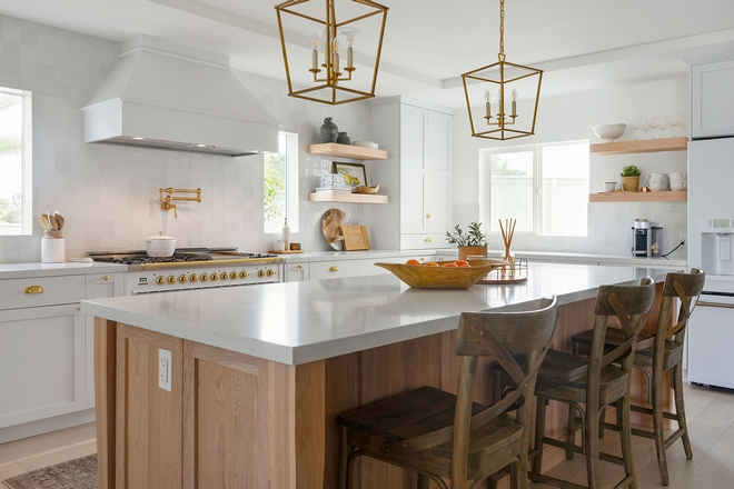 Coastal Farmhouse Kitchen Coastal Farmhouse theme is reinforced with unlacquered brass fixtures and lighting and the combination of painted white and white oak cabinets Coastal Farmhouse Kitchen Coastal Farmhouse Coastal Farmhouse Kitchen Coastal Farmhouse Coastal Farmhouse Kitchen Coastal Farmhouse #CoastalFarmhouseKitchen #CoastalFarmhouse