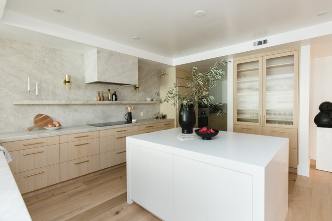 Kitchen was recently renovated and it now features custom White Oak cabinets along with a sleek slab hood #kitchen #Kitchenrenovation #renovatedkitchen #WhiteOakkitchen #kitchencabinet #slabkitchenhood