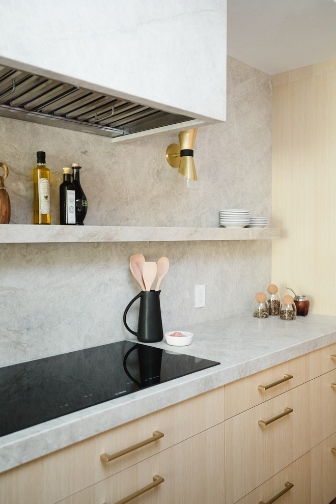 A custom Quartzite ledge shelf is perfect to add some interest to a slab backsplash not to mention to display some beautiful decor or oils Kitchen Backsplash Ledge Shelf Kitchen Backsplash Ledge Shelf #Kitchen #Backsplash #Ledge #Shelf