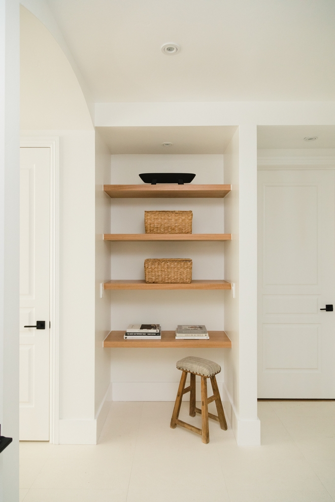 In this Bathroom renovation a wall niche was added and accentuated with floating White Oak shelves for extra storage #bathroom #renovation #wallniche #niche #whiteoak #floatingshelves