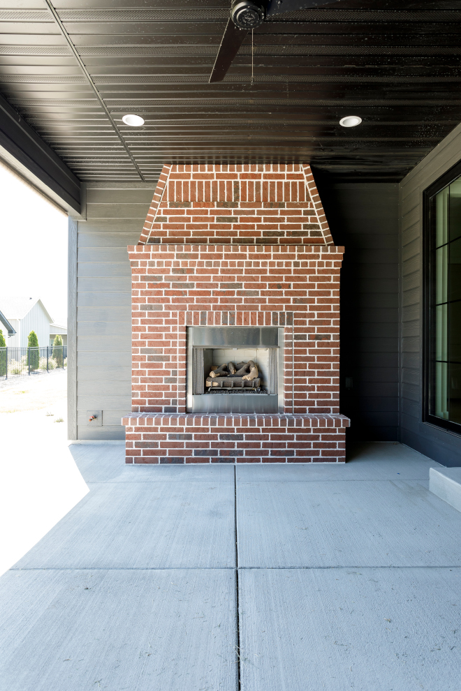 Back Porch Fireplace We extended the back porch and added a statement fireplace to draw everyone out #backporch #fireplace