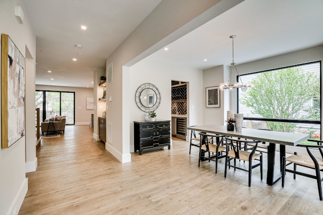 Dining Room Minimal in nature this dining room boasts large windows allowing for an abundance of natural light #diningroom