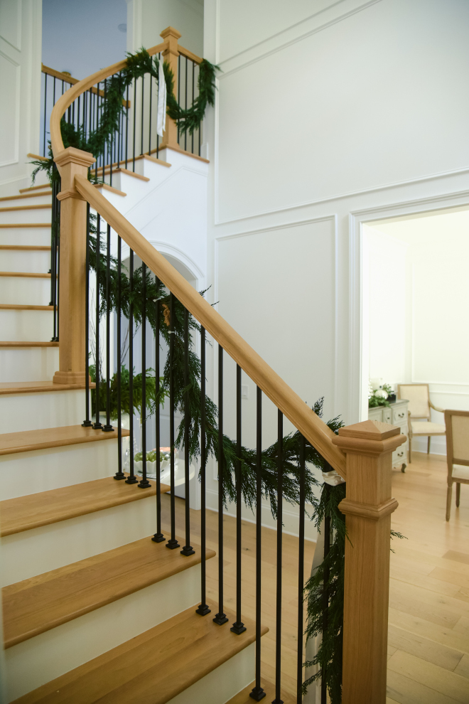 The arched staircase features solid white oak treads stained to match the flooring #staircase #stair #treads #whiteoak