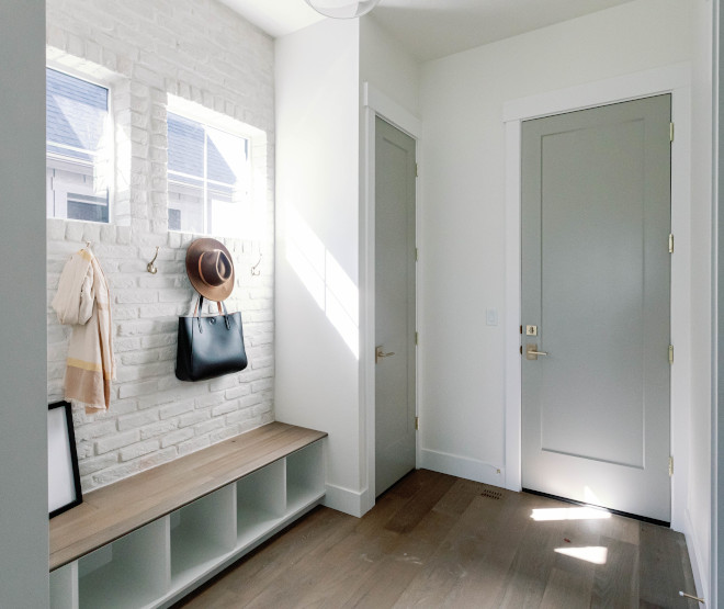 Mudroom bench features hardwood floor top