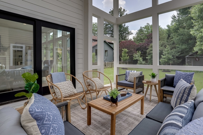 In order to continue with spacious high ceilings and an abundance of natural light we built a two story screened porch We didn’t want a one story screened porch because it would have blocked the sunlight for the home office and great room It truly exudes the best of indoor-outdoor living #screenedporch