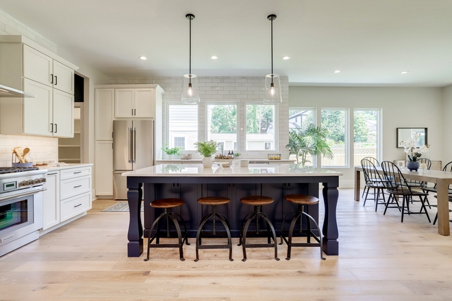 The kitchen incorporates a lot of beautiful windows along the left side of the house which evokes a lot of natural light #kitchen #naturallight