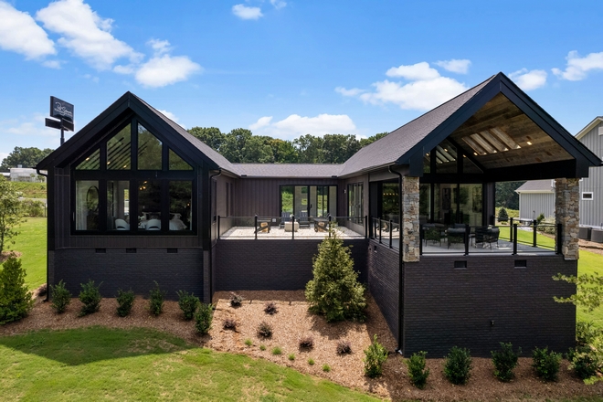 This home features two outdoor living spaces off the back of the home The covered porch off the great room and a courtyard off the foyer are both great places to enjoy the outdoors