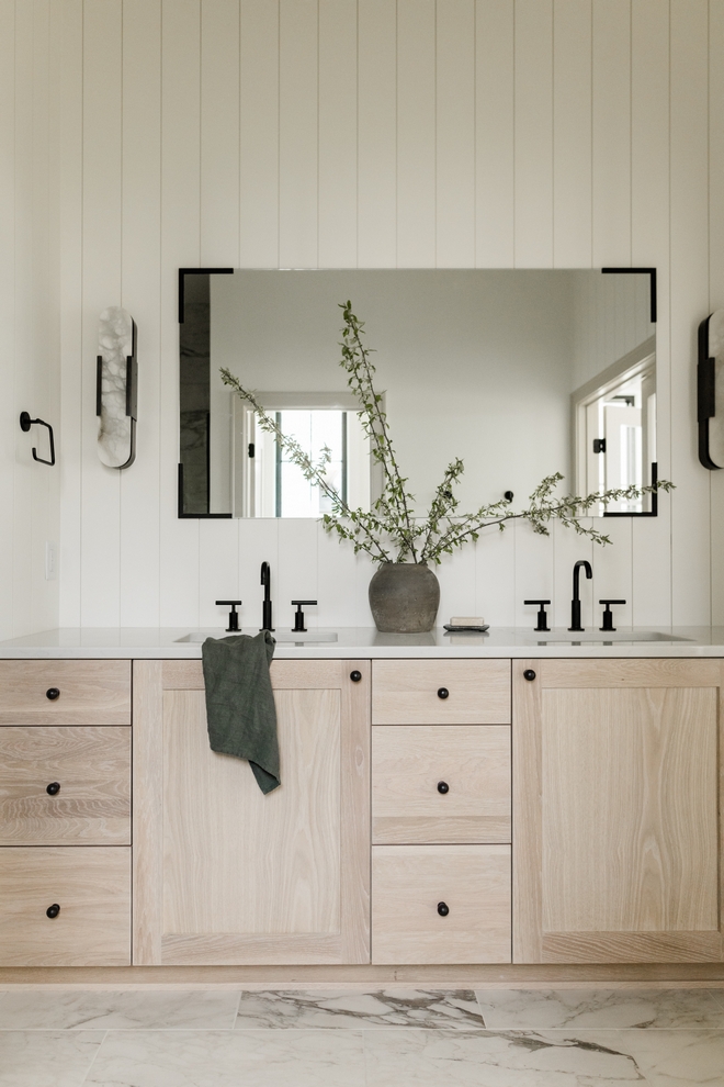 This is a great example of a neutral bathroom that feels warm and features plenty of textures