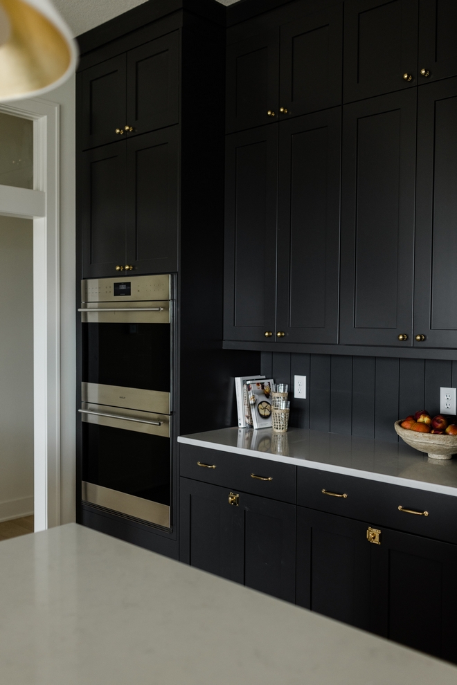 Black kitchen with black shiplap backsplash