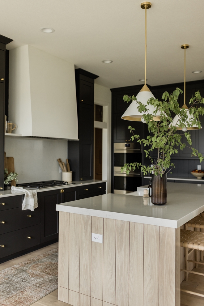 Back and sides of the island feature custom inset cabinets mimicking Shiplap